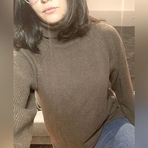 Brown knit turtleneck sweater from Kotn.